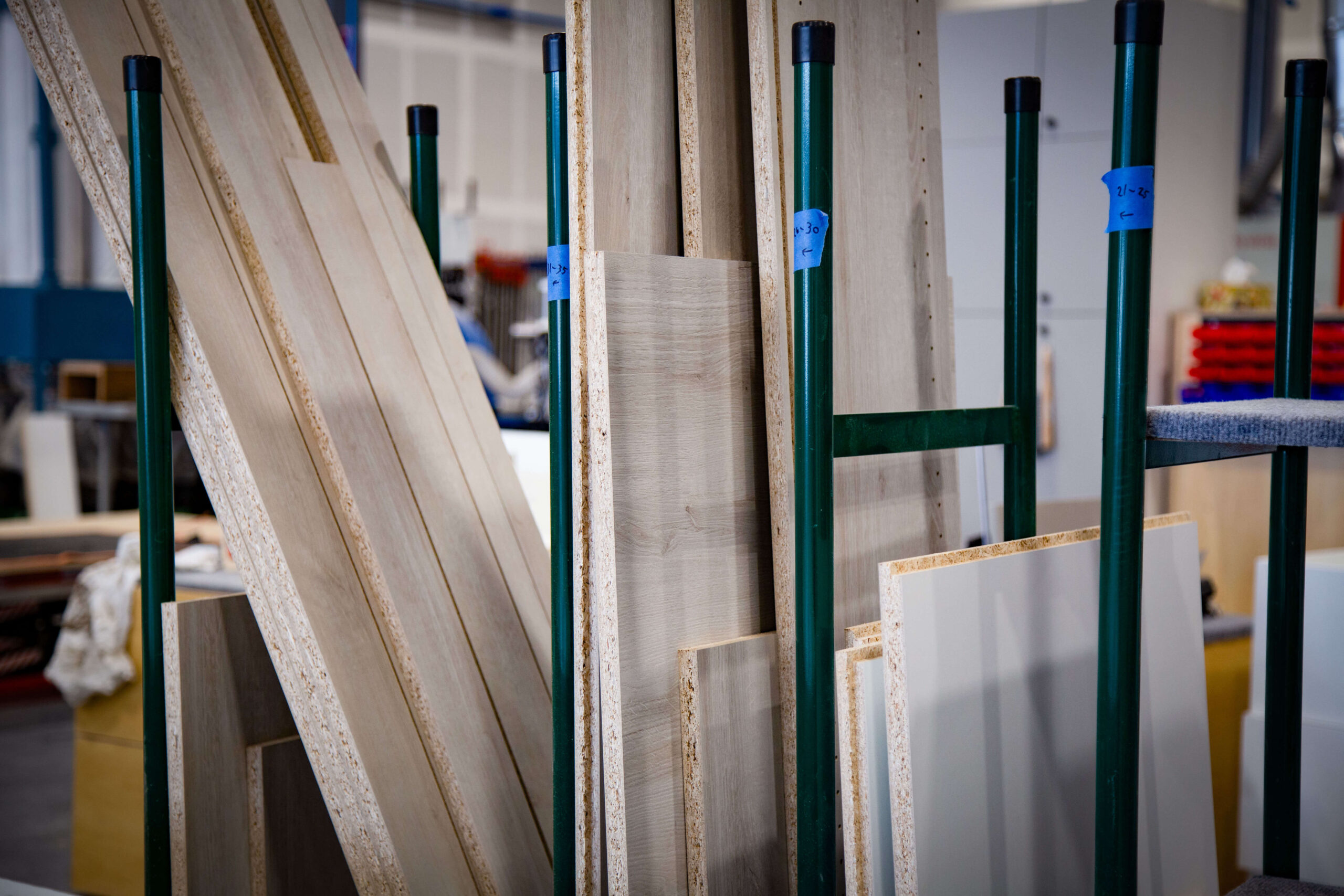 Sheet stock and hardwood racked in the shop
