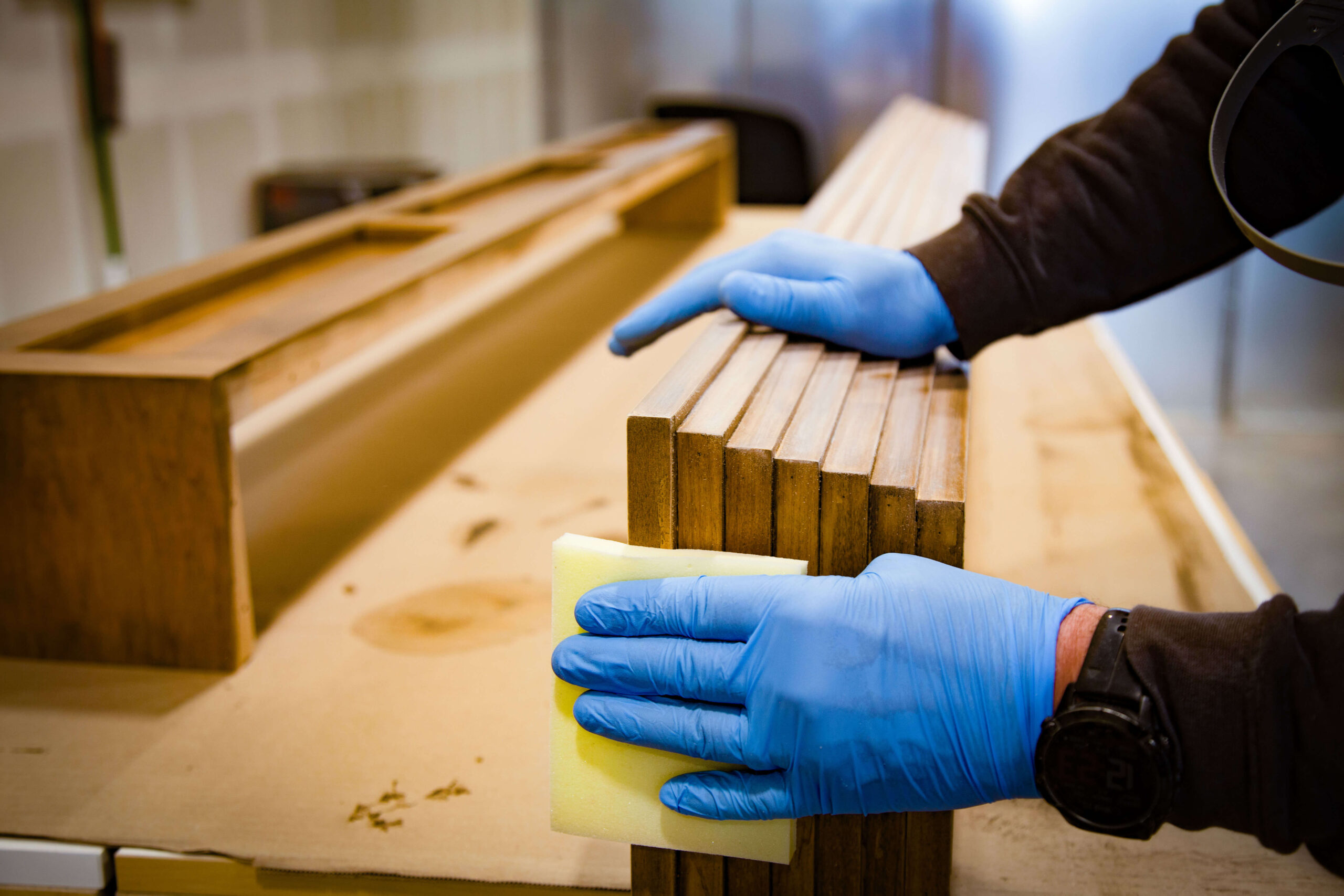 Hand-finishing a solid wood cabinet frame