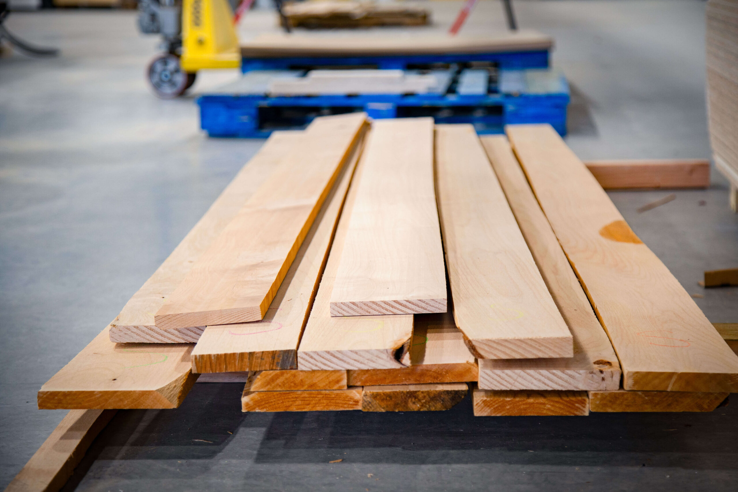Milled hardwood boards stacked on a pallet