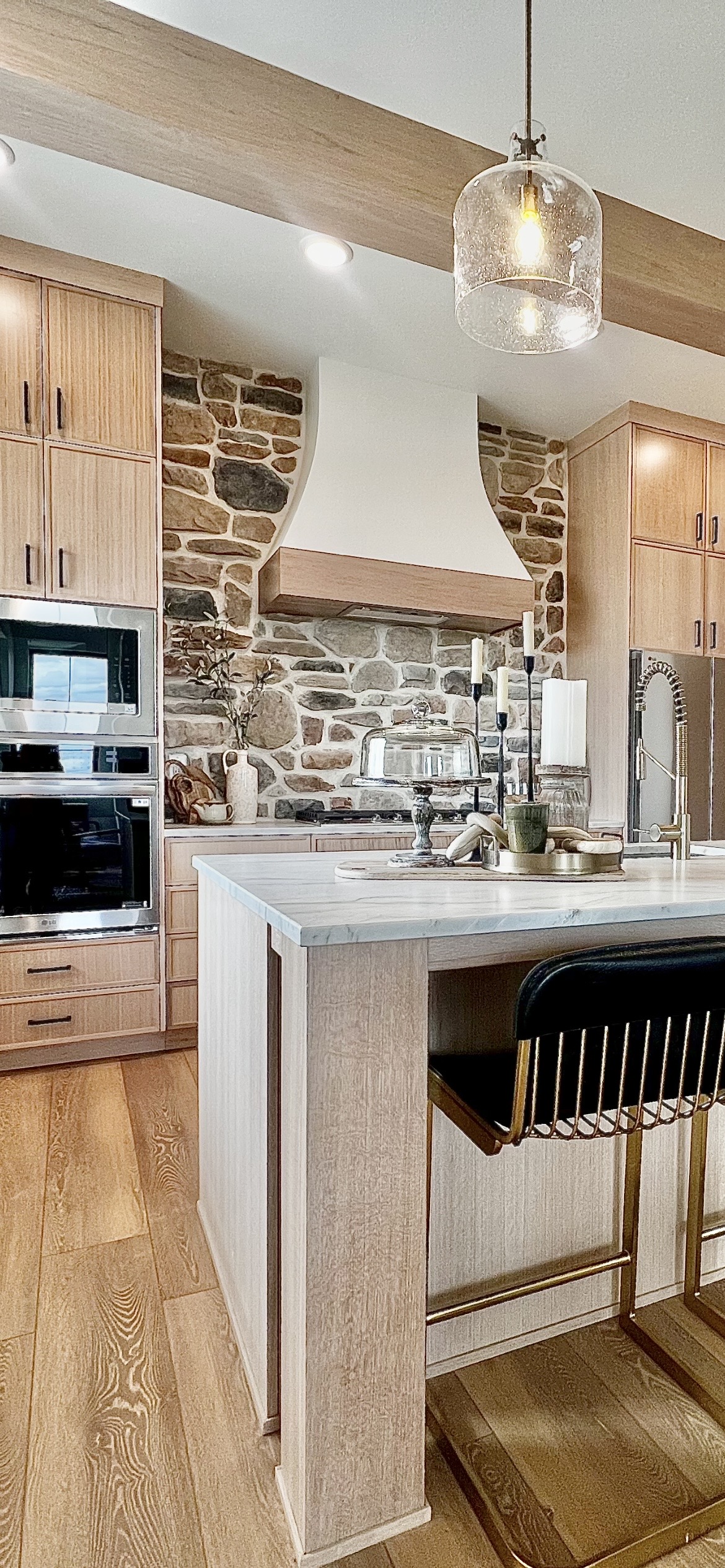 Kitchen island end panel and stone range wall