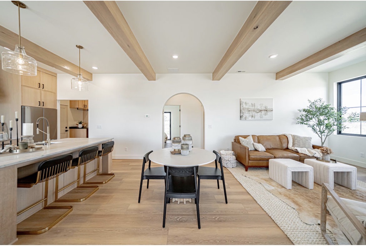 Kitchen, dining, and living spaces in one open plan